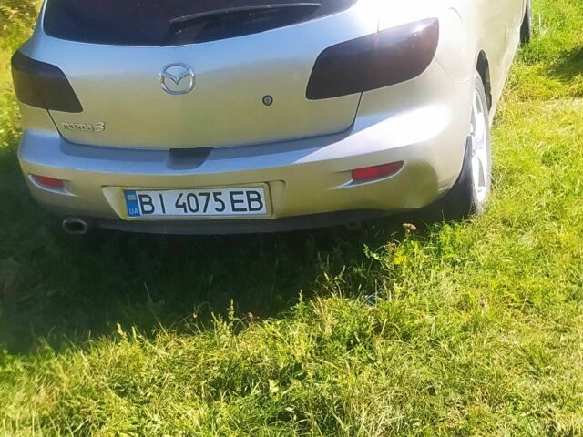 Серый Мазда 3, объемом двигателя 1.6 л и пробегом 300 тыс. км за 1393 $, фото 1 на Automoto.ua