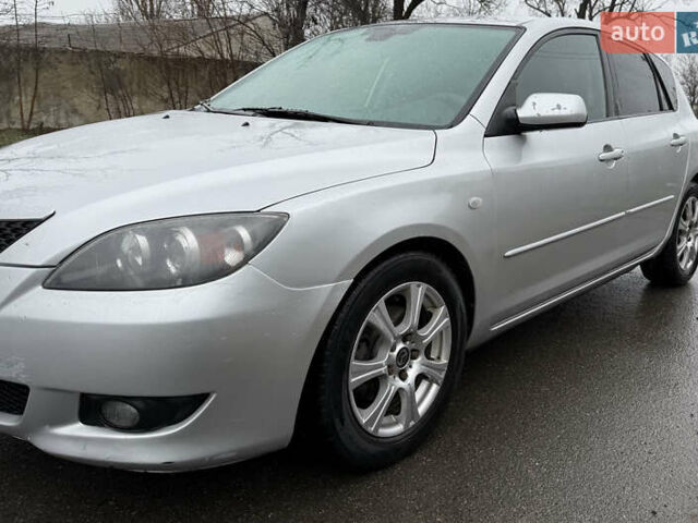 Сірий Мазда 3, об'ємом двигуна 1.4 л та пробігом 284 тис. км за 4150 $, фото 1 на Automoto.ua