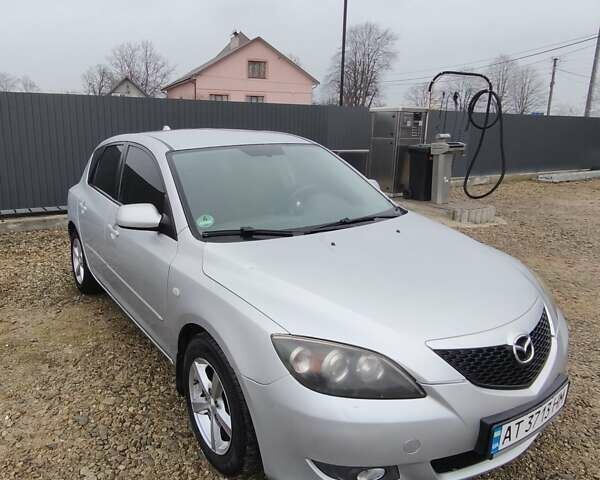 Сірий Мазда 3, об'ємом двигуна 1.6 л та пробігом 263 тис. км за 4700 $, фото 1 на Automoto.ua