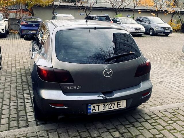 Сірий Мазда 3, об'ємом двигуна 1.3 л та пробігом 305 тис. км за 3600 $, фото 1 на Automoto.ua