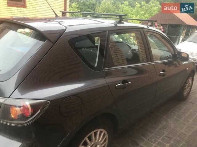 Серый Мазда 3, объемом двигателя 1.6 л и пробегом 208 тыс. км за 5000 $, фото 1 на Automoto.ua