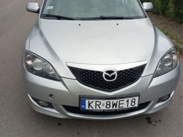 Серый Мазда 3, объемом двигателя 1.6 л и пробегом 239 тыс. км за 1872 $, фото 1 на Automoto.ua