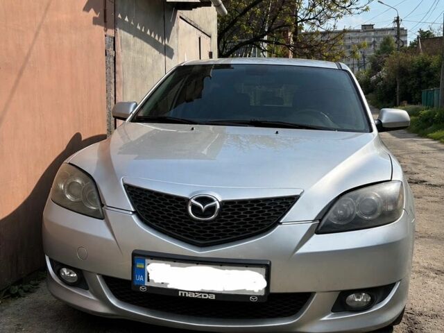 Серый Мазда 3, объемом двигателя 1.6 л и пробегом 239 тыс. км за 3800 $, фото 1 на Automoto.ua