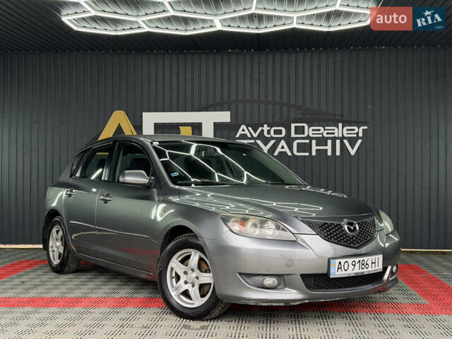 Серый Мазда 3, объемом двигателя 1.6 л и пробегом 301 тыс. км за 3400 $, фото 1 на Automoto.ua
