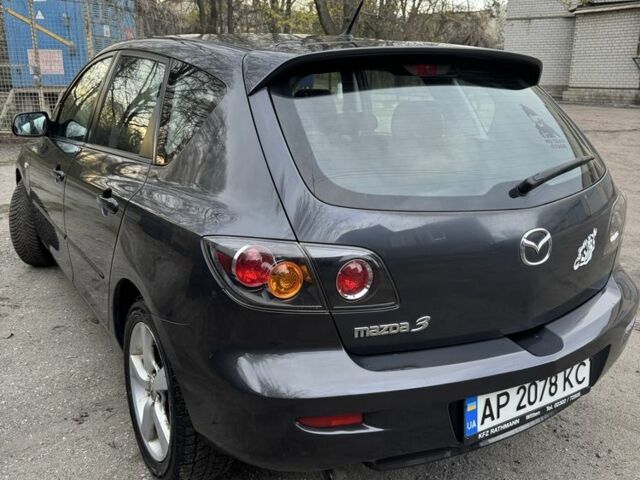 Сірий Мазда 3, об'ємом двигуна 1.6 л та пробігом 245 тис. км за 4500 $, фото 1 на Automoto.ua