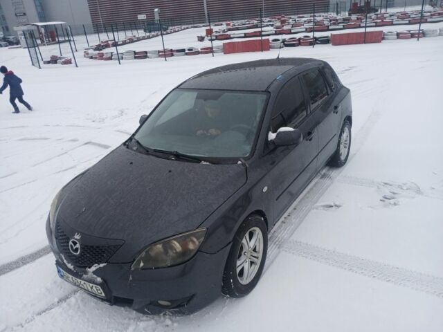 Серый Мазда 3, объемом двигателя 1.6 л и пробегом 240 тыс. км за 2940 $, фото 1 на Automoto.ua