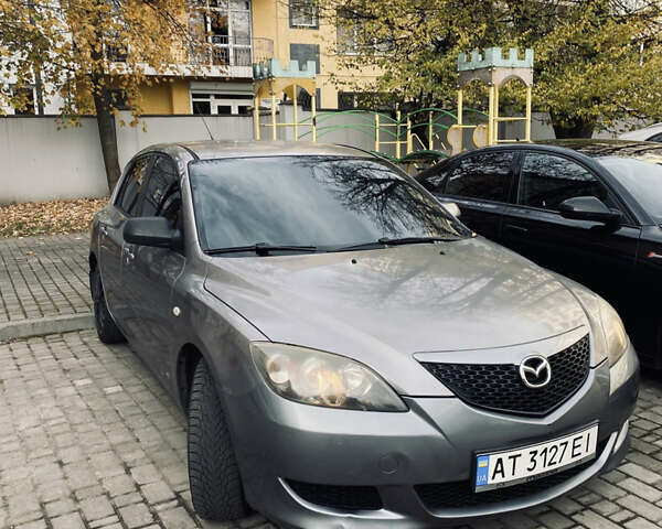 Серый Мазда 3, объемом двигателя 1.35 л и пробегом 304 тыс. км за 3500 $, фото 1 на Automoto.ua