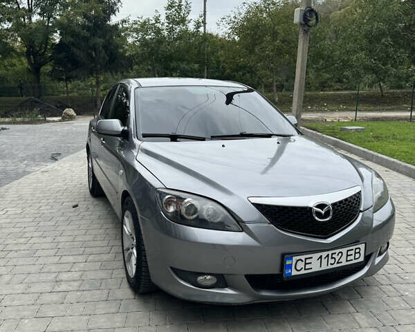 Сірий Мазда 3, об'ємом двигуна 1.56 л та пробігом 319 тис. км за 3700 $, фото 1 на Automoto.ua