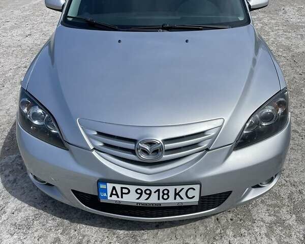 Серый Мазда 3, объемом двигателя 2 л и пробегом 300 тыс. км за 5300 $, фото 1 на Automoto.ua