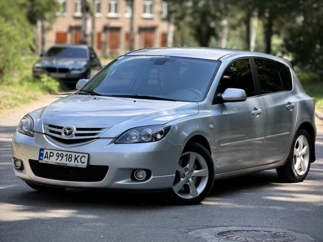 Серый Мазда 3, объемом двигателя 2 л и пробегом 192 тыс. км за 3900 $, фото 1 на Automoto.ua