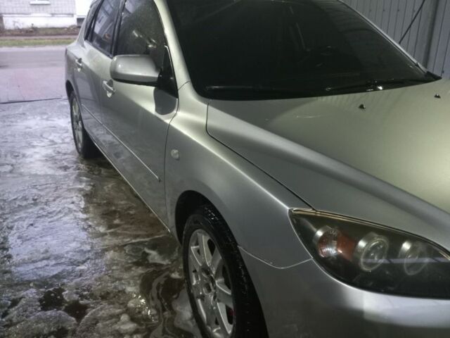 Серый Мазда 3, объемом двигателя 1.6 л и пробегом 293 тыс. км за 4200 $, фото 1 на Automoto.ua