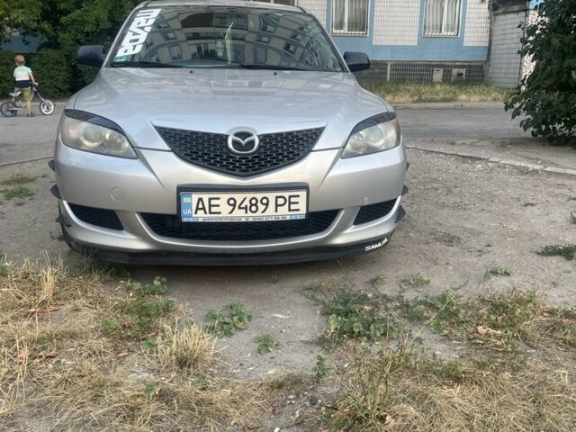 Сірий Мазда 3, об'ємом двигуна 1.3 л та пробігом 217 тис. км за 4999 $, фото 1 на Automoto.ua