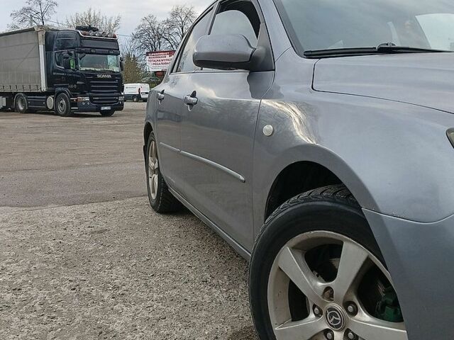 Сірий Мазда 3, об'ємом двигуна 1.6 л та пробігом 295 тис. км за 3000 $, фото 1 на Automoto.ua
