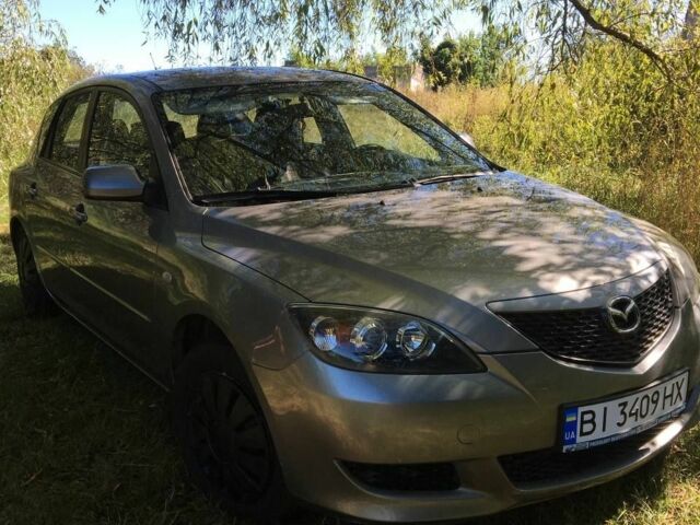 Сірий Мазда 3, об'ємом двигуна 1.3 л та пробігом 220 тис. км за 4181 $, фото 1 на Automoto.ua