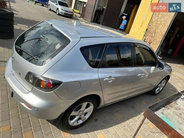 Серый Мазда 3, объемом двигателя 1.6 л и пробегом 273 тыс. км за 4800 $, фото 1 на Automoto.ua