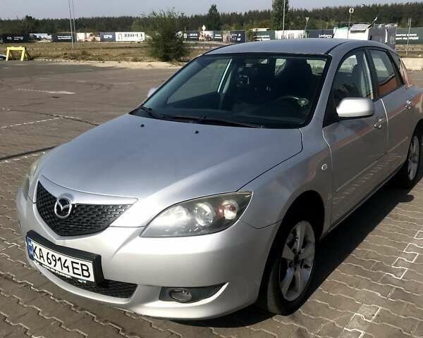 Серый Мазда 3, объемом двигателя 1.3 л и пробегом 235 тыс. км за 3400 $, фото 1 на Automoto.ua