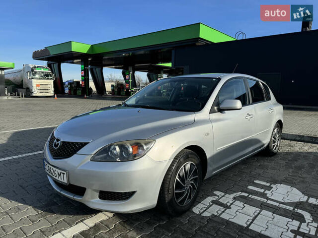 Серый Мазда 3, объемом двигателя 1.6 л и пробегом 227 тыс. км за 4400 $, фото 1 на Automoto.ua