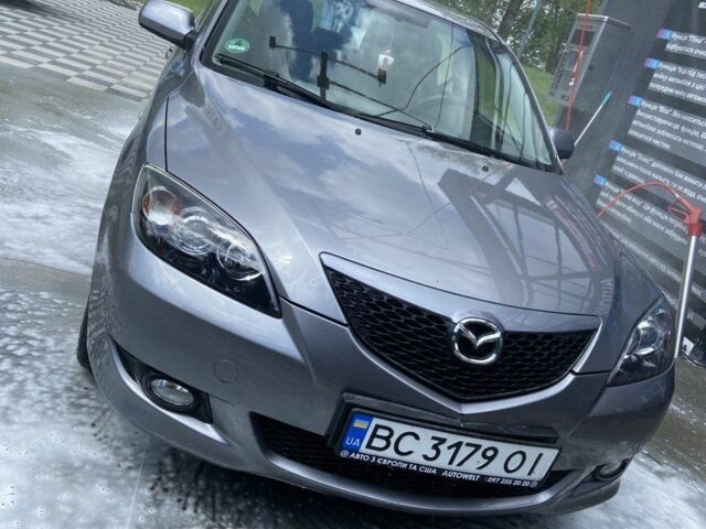 Серый Мазда 3, объемом двигателя 1.6 л и пробегом 239 тыс. км за 4800 $, фото 1 на Automoto.ua