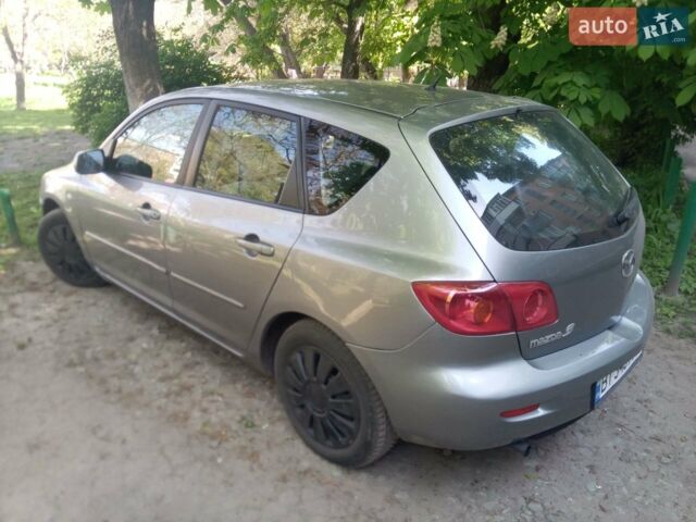 Сірий Мазда 3, об'ємом двигуна 1.4 л та пробігом 220 тис. км за 4200 $, фото 1 на Automoto.ua