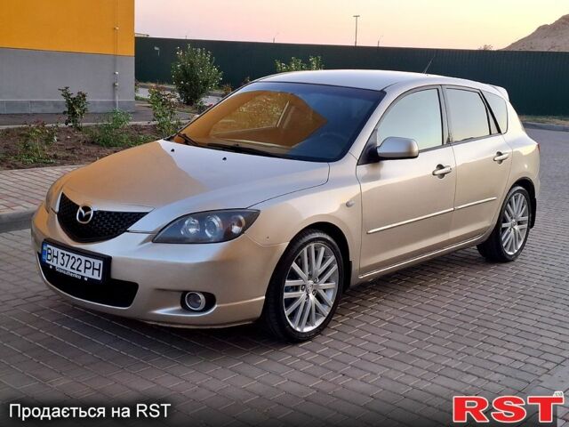 Серый Мазда 3, объемом двигателя 1.6 л и пробегом 259 тыс. км за 4900 $, фото 1 на Automoto.ua