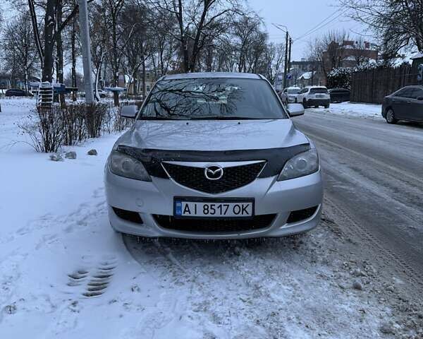 Серый Мазда 3, объемом двигателя 1.6 л и пробегом 270 тыс. км за 4500 $, фото 1 на Automoto.ua