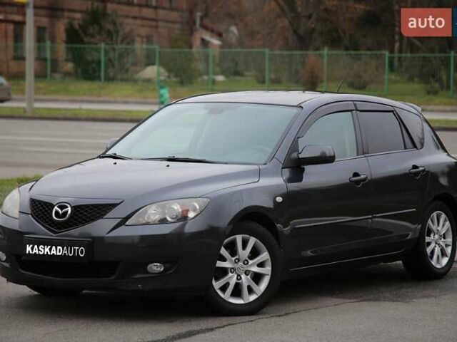 Серый Мазда 3, объемом двигателя 1.6 л и пробегом 247 тыс. км за 4999 $, фото 1 на Automoto.ua