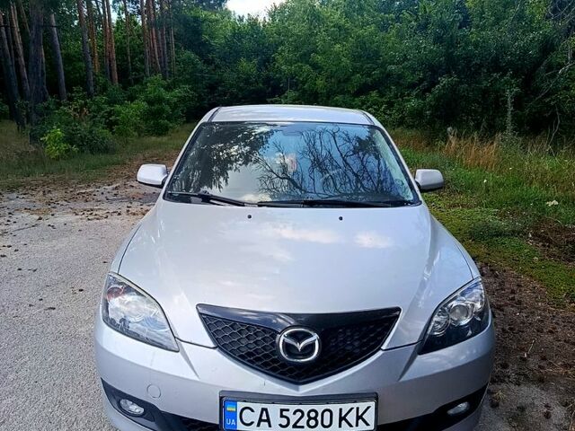Серый Мазда 3, объемом двигателя 1.6 л и пробегом 254 тыс. км за 4800 $, фото 1 на Automoto.ua