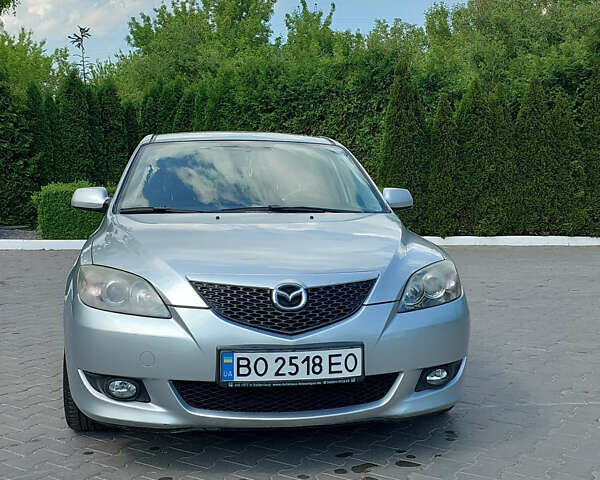 Серый Мазда 3, объемом двигателя 1.6 л и пробегом 211 тыс. км за 4750 $, фото 1 на Automoto.ua