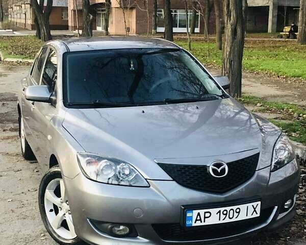 Серый Мазда 3, объемом двигателя 1.56 л и пробегом 179 тыс. км за 5450 $, фото 1 на Automoto.ua