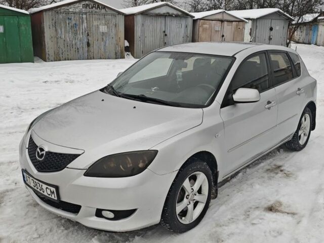 Серый Мазда 3, объемом двигателя 1.6 л и пробегом 385 тыс. км за 3605 $, фото 1 на Automoto.ua