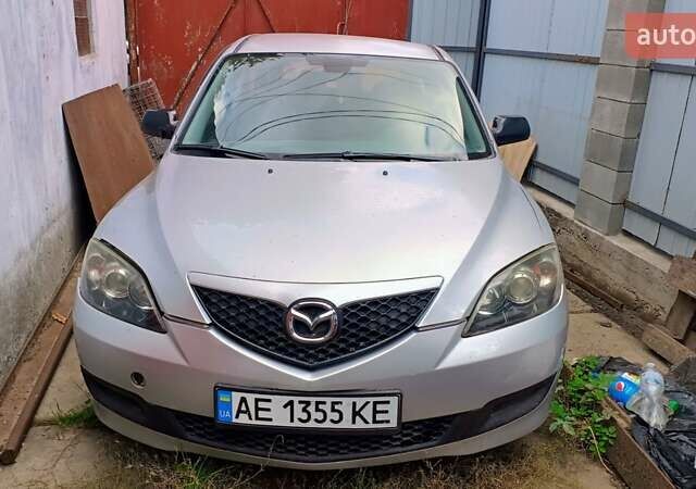 Сірий Мазда 3, об'ємом двигуна 1.3 л та пробігом 237 тис. км за 1500 $, фото 1 на Automoto.ua