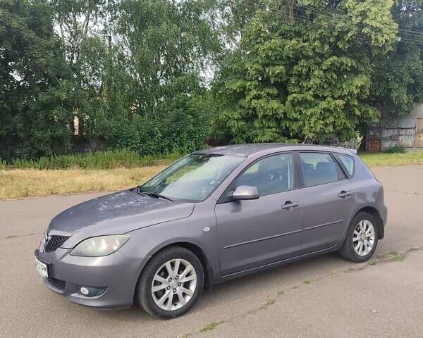 Серый Мазда 3, объемом двигателя 1.6 л и пробегом 358 тыс. км за 4100 $, фото 1 на Automoto.ua