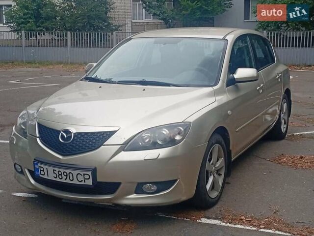 Серый Мазда 3, объемом двигателя 1.6 л и пробегом 220 тыс. км за 4000 $, фото 1 на Automoto.ua
