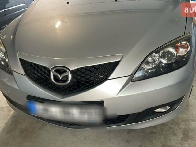 Серый Мазда 3, объемом двигателя 1.6 л и пробегом 145 тыс. км за 5500 $, фото 1 на Automoto.ua