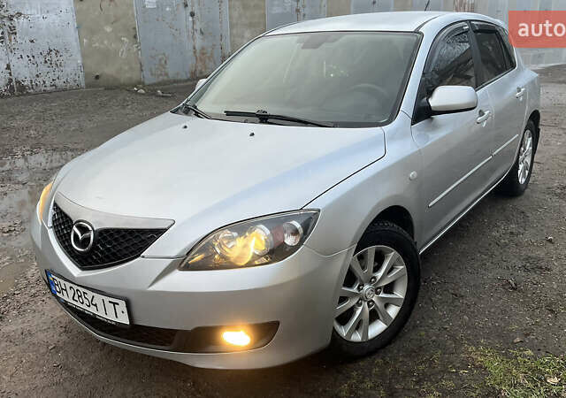 Серый Мазда 3, объемом двигателя 1.6 л и пробегом 310 тыс. км за 5400 $, фото 1 на Automoto.ua