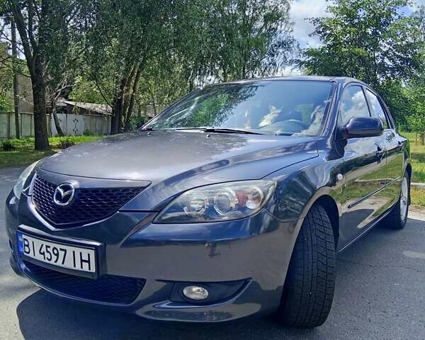 Сірий Мазда 3, об'ємом двигуна 1.56 л та пробігом 247 тис. км за 6700 $, фото 1 на Automoto.ua