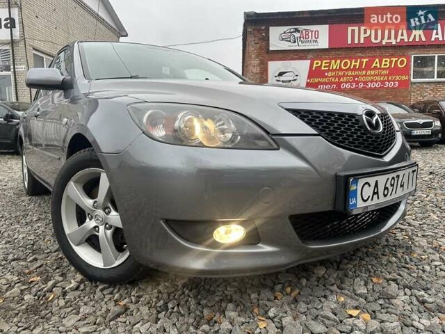 Сірий Мазда 3, об'ємом двигуна 1.6 л та пробігом 216 тис. км за 4800 $, фото 1 на Automoto.ua