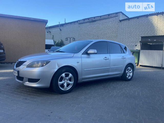 Серый Мазда 3, объемом двигателя 1.56 л и пробегом 250 тыс. км за 3000 $, фото 1 на Automoto.ua