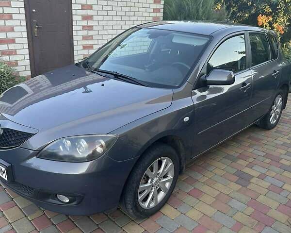Серый Мазда 3, объемом двигателя 1.6 л и пробегом 275 тыс. км за 5200 $, фото 1 на Automoto.ua