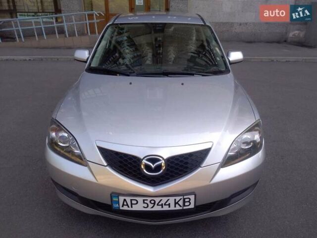 Серый Мазда 3, объемом двигателя 1.56 л и пробегом 174 тыс. км за 6000 $, фото 1 на Automoto.ua