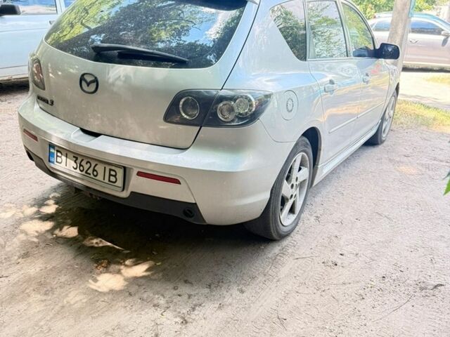 Серый Мазда 3, объемом двигателя 2 л и пробегом 305 тыс. км за 3400 $, фото 1 на Automoto.ua