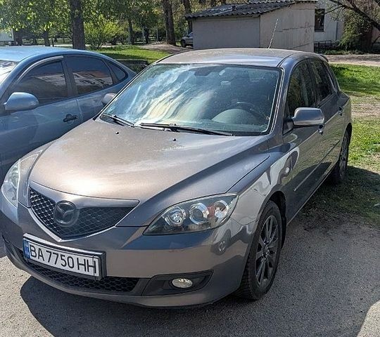 Серый Мазда 3, объемом двигателя 1.6 л и пробегом 171 тыс. км за 4800 $, фото 1 на Automoto.ua