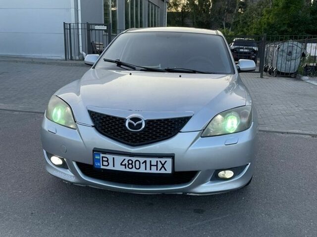 Серый Мазда 3, объемом двигателя 1.61 л и пробегом 243 тыс. км за 5000 $, фото 1 на Automoto.ua