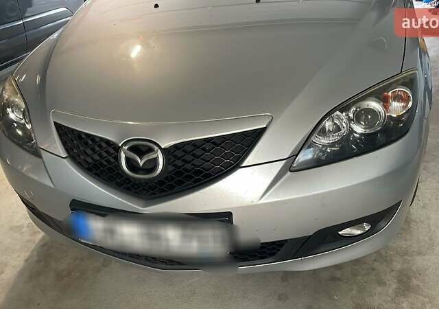 Серый Мазда 3, объемом двигателя 1.6 л и пробегом 145 тыс. км за 5500 $, фото 1 на Automoto.ua