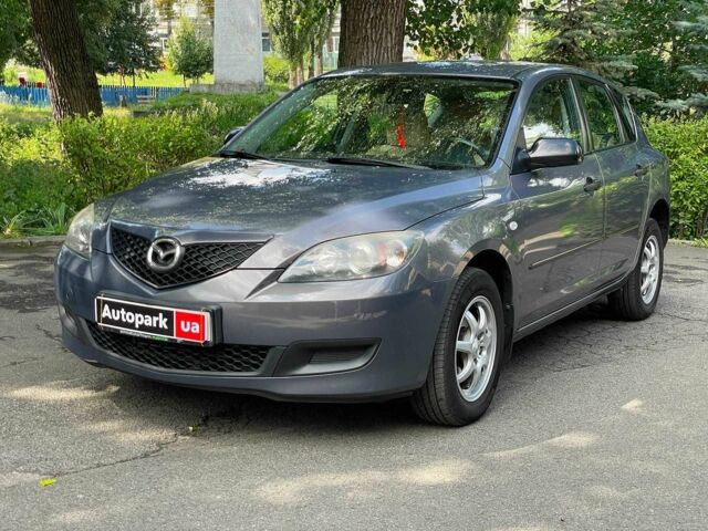 Серый Мазда 3, объемом двигателя 1.4 л и пробегом 305 тыс. км за 4940 $, фото 1 на Automoto.ua