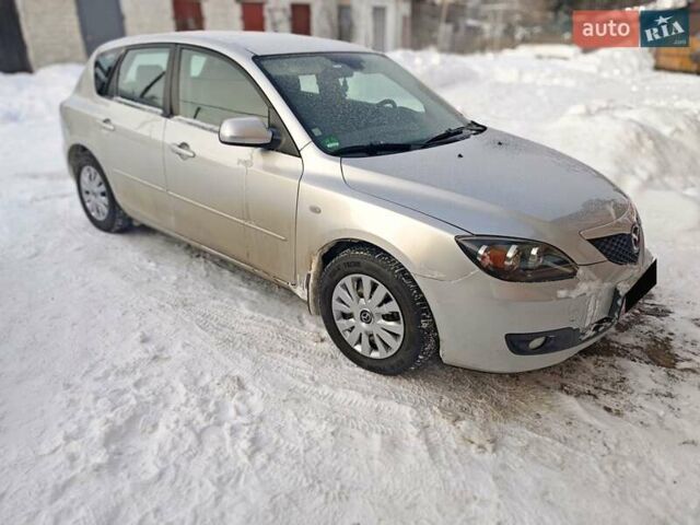 Серый Мазда 3, объемом двигателя 1.6 л и пробегом 118 тыс. км за 5599 $, фото 1 на Automoto.ua