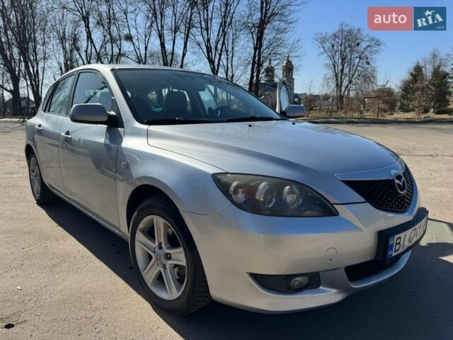 Серый Мазда 3, объемом двигателя 1.6 л и пробегом 209 тыс. км за 5300 $, фото 1 на Automoto.ua