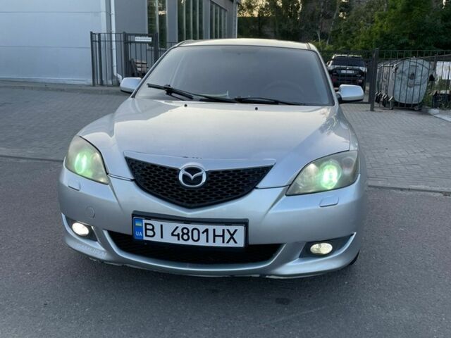 Серый Мазда 3, объемом двигателя 1.61 л и пробегом 259 тыс. км за 4500 $, фото 1 на Automoto.ua