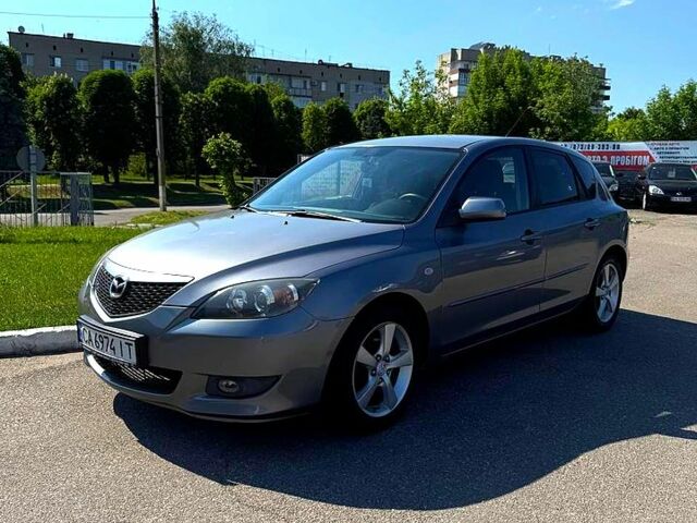 Серый Мазда 3, объемом двигателя 1.6 л и пробегом 215 тыс. км за 4800 $, фото 1 на Automoto.ua