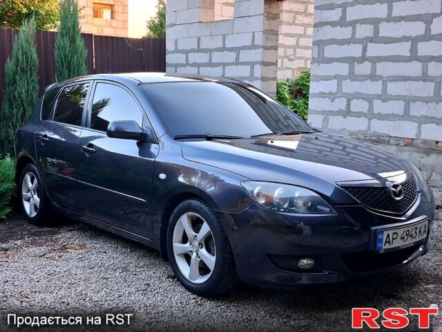 Серый Мазда 3, объемом двигателя 1.6 л и пробегом 244 тыс. км за 4500 $, фото 1 на Automoto.ua